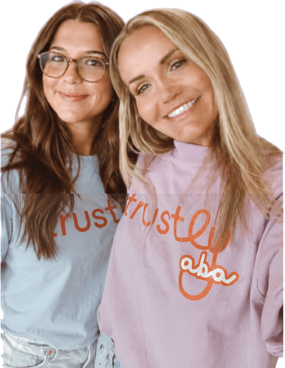 Two members of the Trustly community wearing Trustly shirts